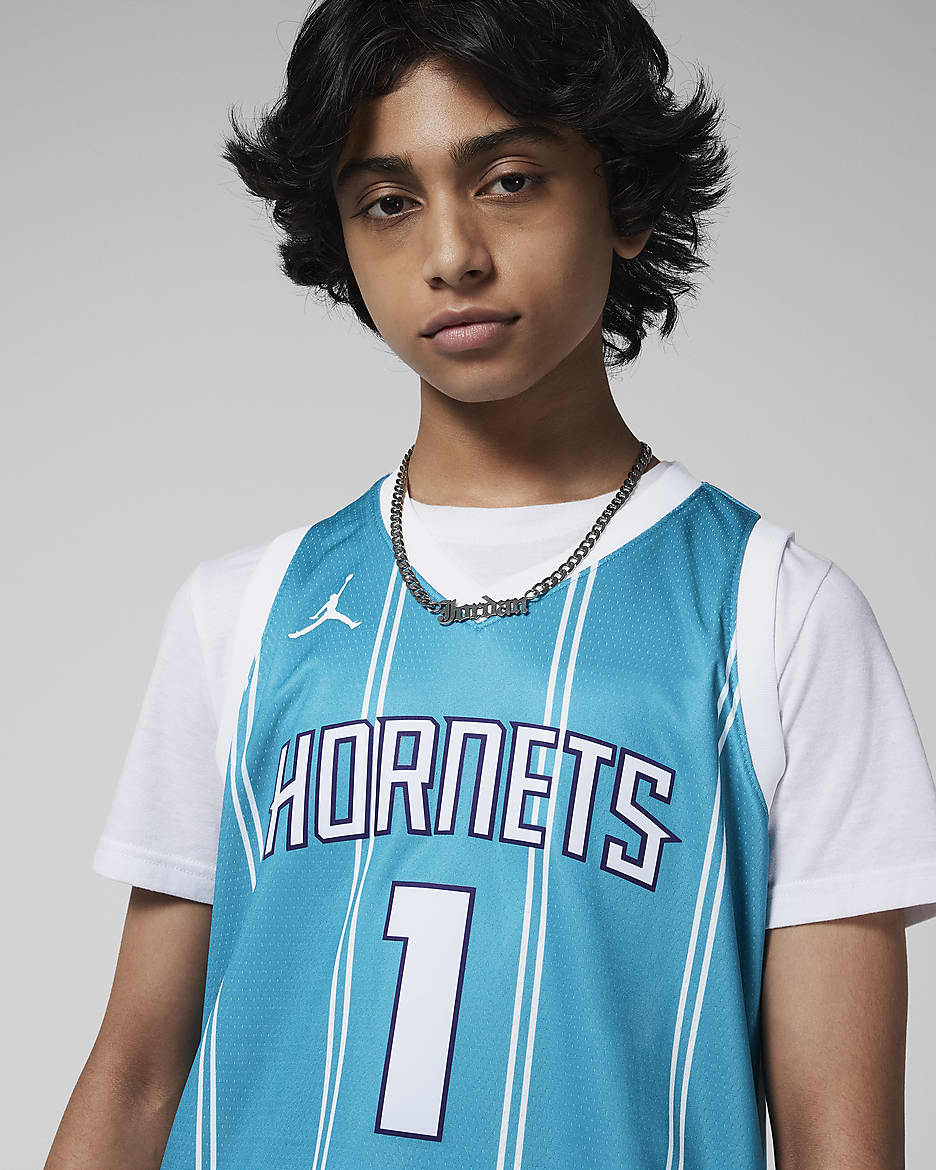 Charlotte Hornets 2023 24 Icon Edition Older Kids Boys Nike Dri FIT NBA Swingman Jersey. Nike PT